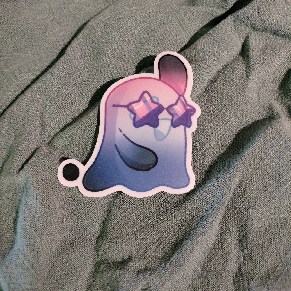 Gradient ghost sticker with star-shaped eyes on a textured gray background