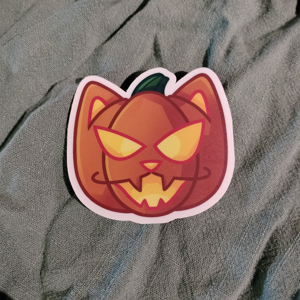 Cartoon pumpkin with a face on a textured gray background