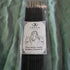 Pack of Freya Incense sticks with a label on a green fabric background