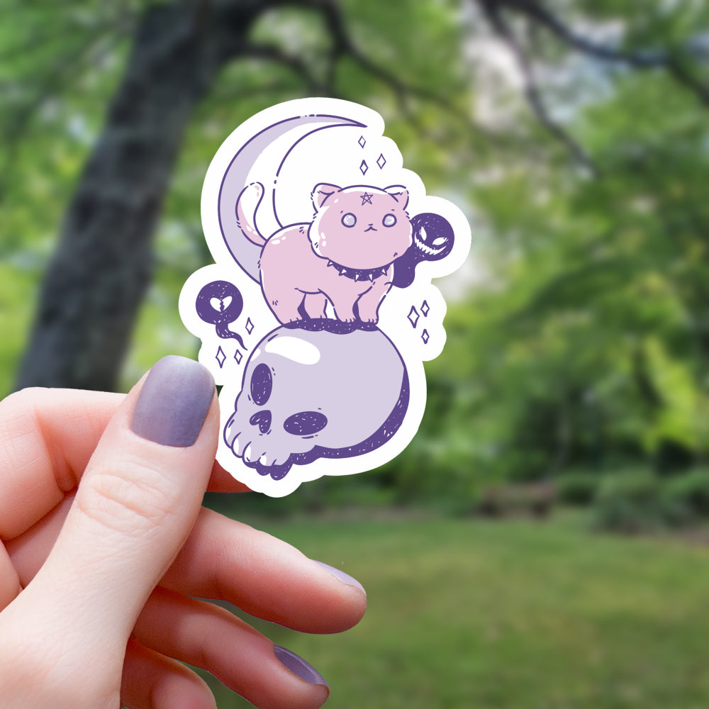 Pastel Gothic Cat Atop Skull Sticker